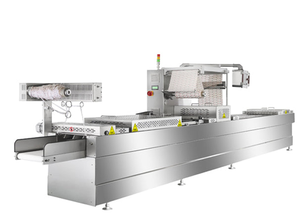 How does a stretch film wrapping machine package products